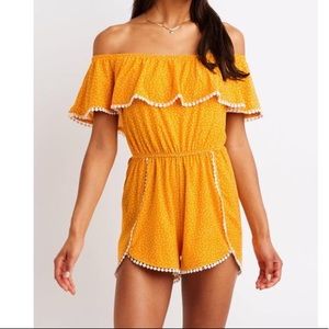 Orange off the shoulder tulip romper